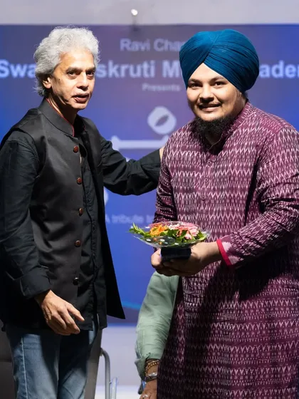 Receiving a token of appreciation from my Guru, Ustad Fazal Qureshi ji. His blessings are my greatest strength.
