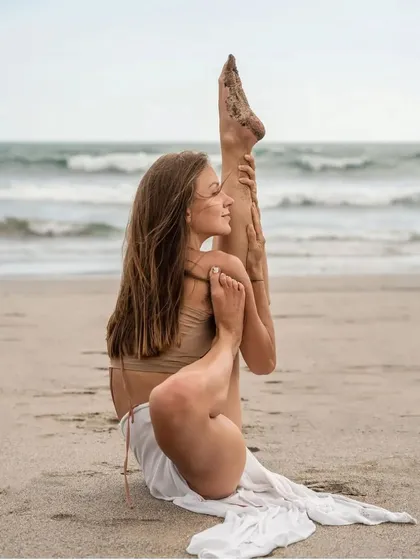 This is a variation of Compass Pose (Parivrtta Surya Yantrasana). It's a deep seated twist and hamstring stretch that opens up the shoulders and side body.