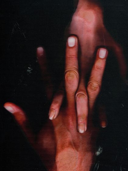 An abstract, scanned image focusing on the detail of intertwined hands. This piece is about texture, form, and connection, representing the more artistic and conceptual aspect of my work.