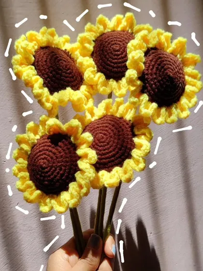 A handful of sunshine. These crochet sunflowers are perfect for creating your own arrangement or gifting to your favorite moms to brighten their day.