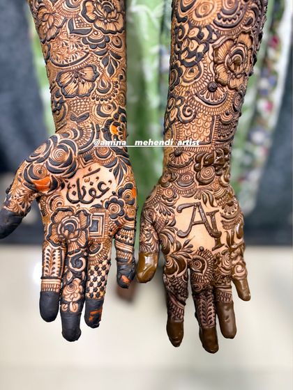 A close-up of the palms, showing the initial 'A' and the name 'Affan' in Arabic.