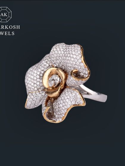 Command attention with our captivating rose-shaped ring, meticulously crafted with pavé-set natural round diamonds. Be admired for your exquisite taste with this elegant masterpiece.