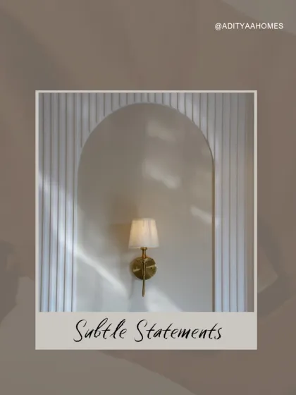 Even the smallest details are designed to make a statement. This elegant wall sconce, set within a fluted arched niche, is a perfect example of the subtle yet impactful touches we add.
