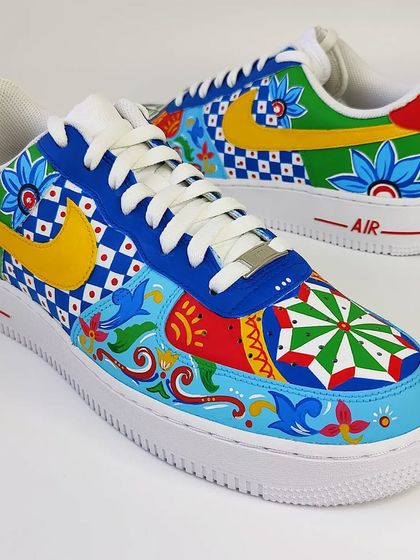 A full profile view of the mismatched truck art Nikes. This is for those who aren't afraid to wear bold, colourful, and truly one-of-a-kind art.