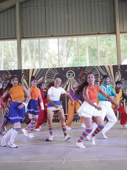 The winning Hip Hop batch in action, showcasing their fun, colorful, and energetic circus-themed routine.