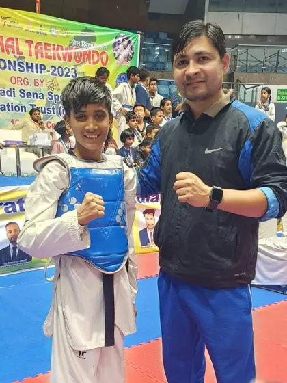 A student in his sparring gear after a match at the national championship.
