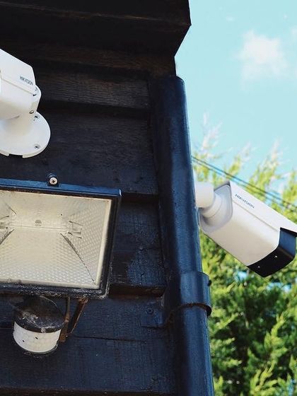 An 8MP 4K IP CCTV installation by our team at a retail location. This setup includes a floodlight to ensure high-quality, full-color video even at night.