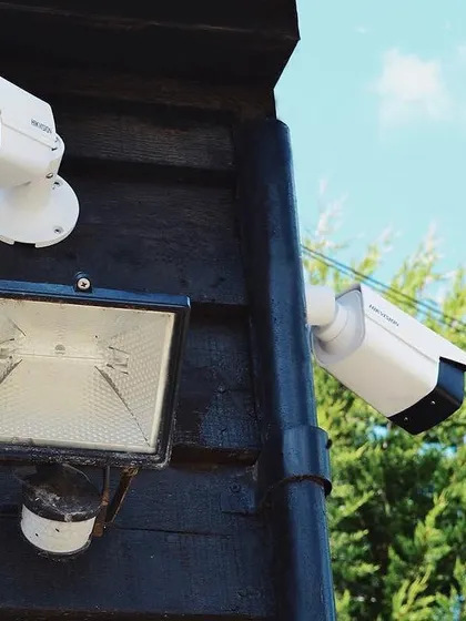 An 8MP 4K IP CCTV installation by our team at a retail location. This setup includes a floodlight to ensure high-quality, full-color video even at night.