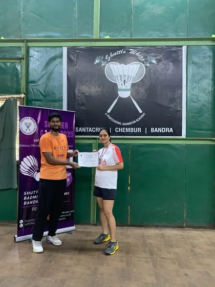 A participant from our adult program is recognized for her performance during the summer camp. We focus on building skills and confidence in every player.