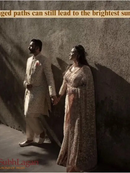 A couple holds hands, standing together against a wall as sunlight streams in. This artistic shot symbolizes that even arranged paths can lead to the brightest future.