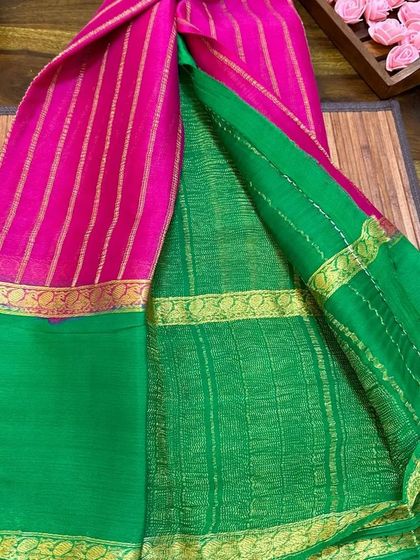 A rani pink and green wrinkle crepe Mysore silk saree.