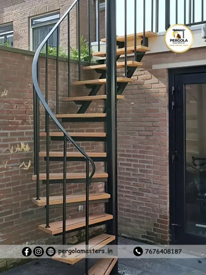 A beautiful spiral staircase featuring warm wooden treads and a slender black metal frame. This combination of materials creates a stylish and inviting look, perfect for connecting a home's interior to a backyard patio.