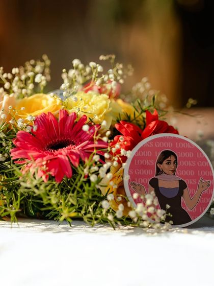 We believe in making every element unique. This fun, illustrated coaster adds a touch of modern humor and personality to the Mehendi celebration.