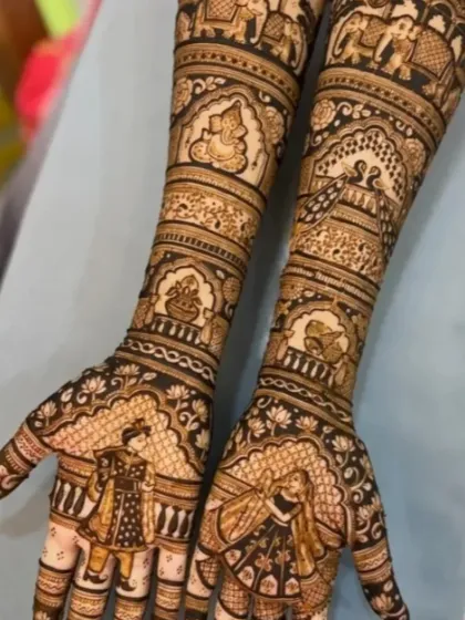 A classic full-coverage bridal design featuring the bride and groom in traditional wedding attire. The arms include auspicious symbols like Lord Ganesha, a kalash, and elephants.