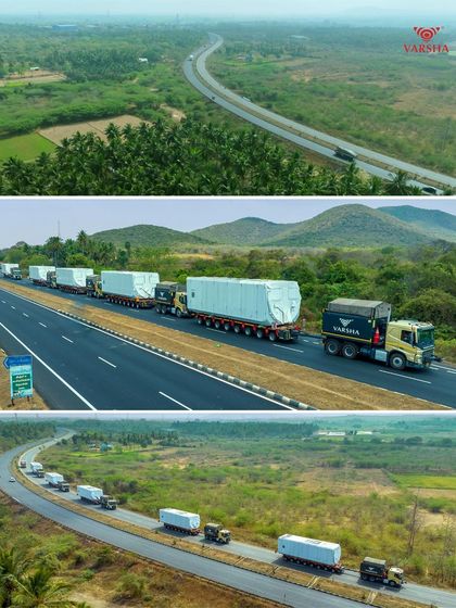 An aerial perspective of a Varsha Logistics convoy navigating the highway in Madurai. These wide shots are perfect for showcasing the scale and reach of a logistics company's operations.