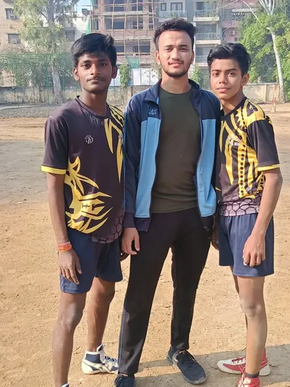 A picture with two of my best raiders. I am proud of their progress and their dedication to becoming top-level players.