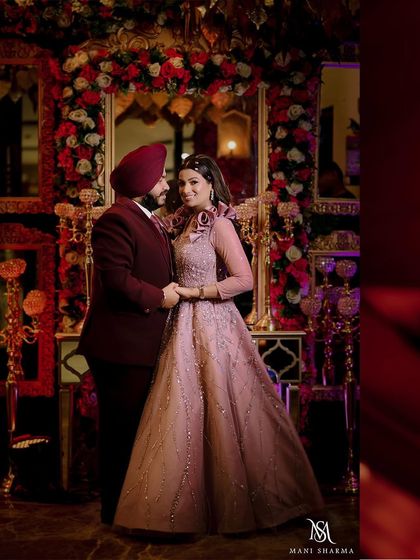 A grand portrait of Sikh couple Karandeep and Simrandeep at their engagement in Delhi.