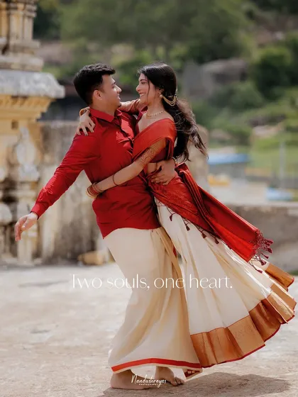 A dynamic shot of a couple dancing, with the text "two souls, one heart" overlaid, emphasizing their connection.