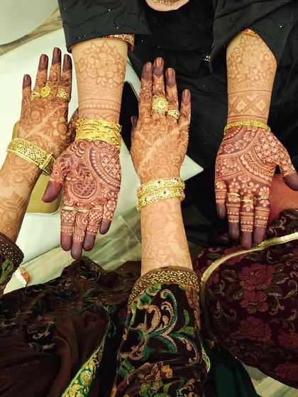 A group shot showing off everyone's beautiful henna stains.