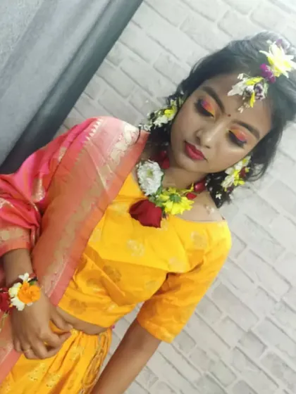 A beautiful portrait of the finished Haldi look. Our students practice on real models to understand different face shapes and skin tones, ensuring they are ready for professional client work.