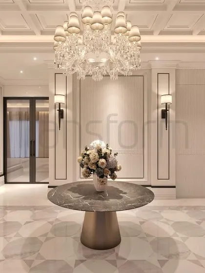 An analysis of a well-designed foyer. The two-tiered chandelier, coffered ceiling, and patterned marble flooring work in harmony. I used dark metal trims to add contrast and definition to the pastel space.