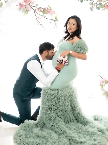 A perfect moment of anticipation. We love using props like these tiny baby shoes to tell your story, especially when paired with a tender kiss from the dad-to-be.