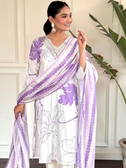 A simple yet chic white rayon kurta with a lovely purple floral print. This is my go-to for an easy, comfortable, and stylish everyday look.