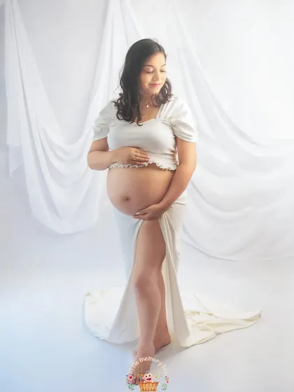 Another angle from our white-on-white session, this image captures a quiet, reflective moment. These are the memories you will look back on with so much love.