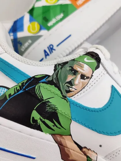 A close-up of the hand-painted portrait of Roger Federer. I wanted to capture his intensity and focus on the court.