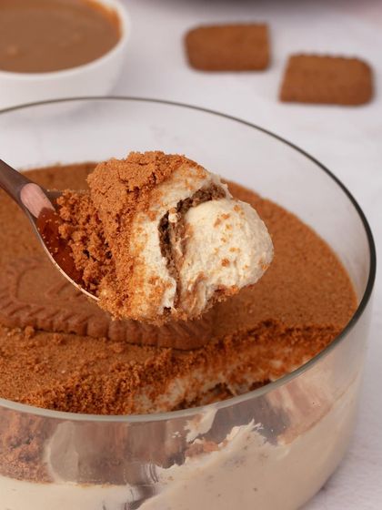 A close-up of my Biscoff Tiramisu, a modern twist on a classic. It combines the irresistible flavor of Biscoff with velvety mascarpone and rich coffee.