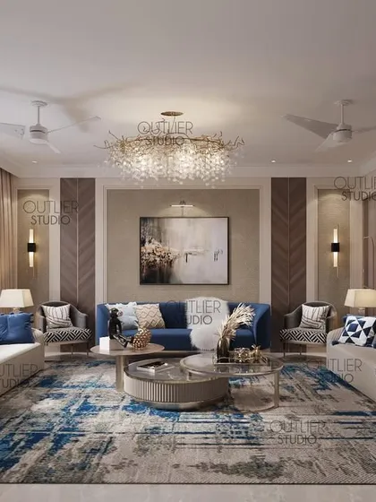 No more Monday blues with this living room. The space is dominated by a large blue and white area rug, with a deep blue sofa and neutral chairs creating a balanced and inviting seating arrangement.