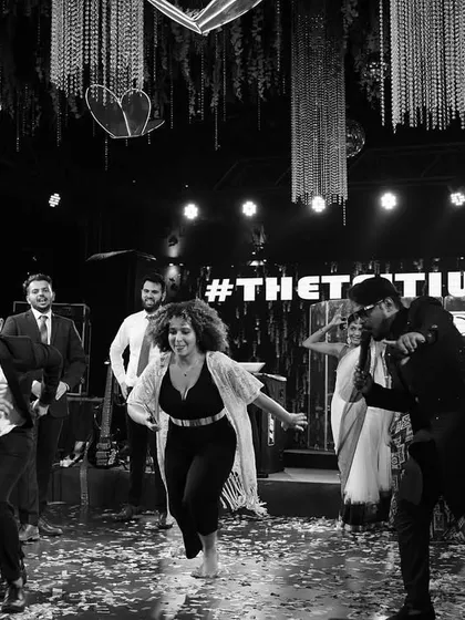 Leading the fun on the dance floor. I don't just stay on stage; I get down with the guests to get the party started and keep it going.