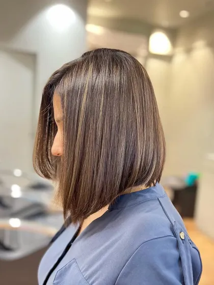 Less is more. These fine blonde highlights were added to a bob haircut to balance the color and create a subtle, sophisticated look.