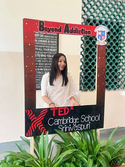 A candid moment at the TEDx event, framed by the theme "Beyond Addiction." It's a reminder that breaking free from compulsive habits is the first step toward reclaiming our focus.
