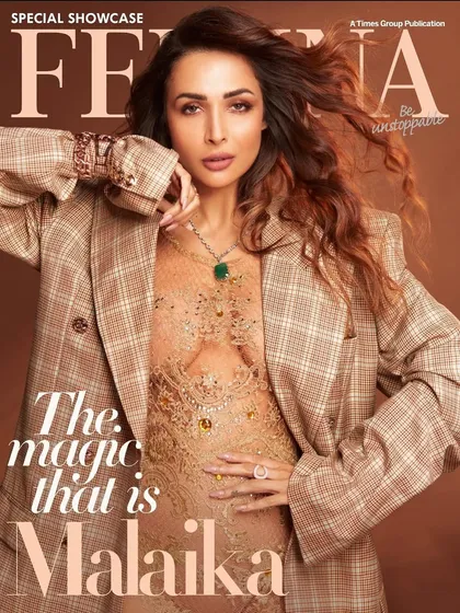 The stunning cover of Femina, featuring Malaika Arora styled by our team. This look, with a plaid blazer over a delicate lace dress, plays with masculine and feminine elements for a powerful fashion statement.