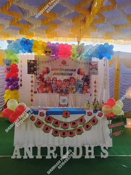 A Cocomelon party setup under a tent, ideal for outdoor or terrace celebrations.