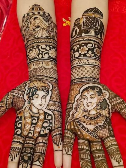 This portrait mehndi is incredibly detailed, capturing the bride and groom's faces with remarkable accuracy. The forearms continue the story with scenes of a bride in a doli and an elephant motif.