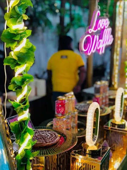 The "Love Waffle" station, where every waffle is made with care and served with a variety of delicious toppings.