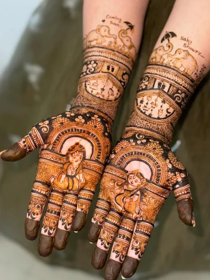 A custom baby shower design featuring Radha Krishna portraits and playful elephant motifs.