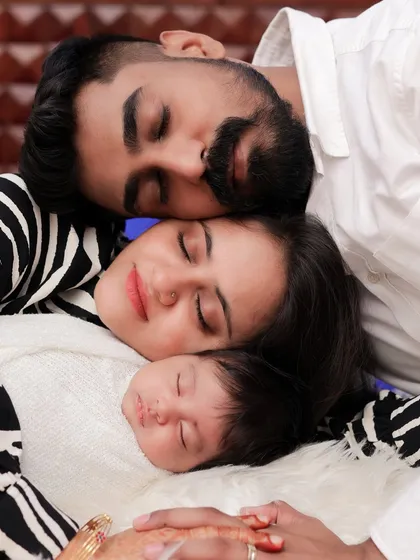 The quiet moments right after a baby arrives are my favorite. This peaceful portrait of a new family, all resting together, captures the incredible bond and love that fills the room. It’s a memory of pure serenity.
