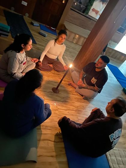 The soft candlelight creates a serene atmosphere for our Tratak meditation session. It's a perfect way to end the day and release mental clutter.