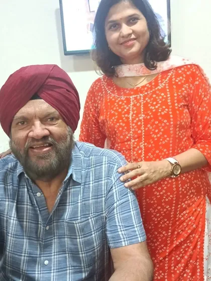 A happy client with one of our senior team members. Building trust and celebrating our clients' transformations is at the heart of what we do.