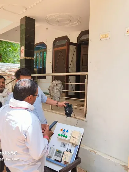 A close-up of our team demonstrating the electrical components of an automation system to an interested farmer. These detailed, one-on-one interactions during our Kisan Sabhas are crucial for building trust and ensuring clarity.