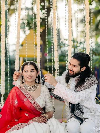A tender moment between Khushali and Niranjan during their ceremony, showcasing the quiet connection and love they share.
