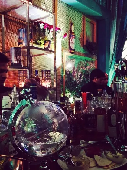 Our team at a molecular gastronomy-themed bar. This setup includes unique lab-style glassware and equipment, showcasing one of our more scientific and experimental bar concepts.