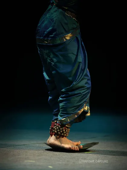The Tarangam is a signature element of Kuchipudi, where I dance upon the rim of a brass plate. It is a test of balance, rhythm, and concentration, symbolizing the beautiful, precarious balance of life itself.