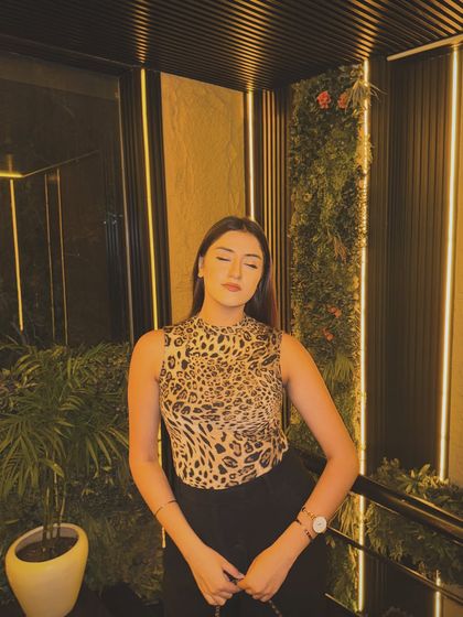 Feeling leopardess-y in this animal print top and black trousers. The moody lighting gives it a very chic vibe.