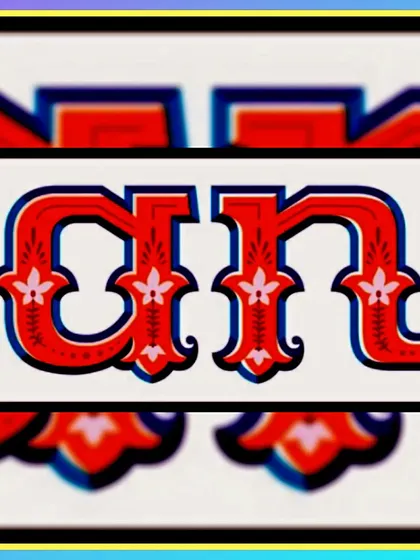 The Hindi letter 'OM' painted with intricate floral decorations inside the character.