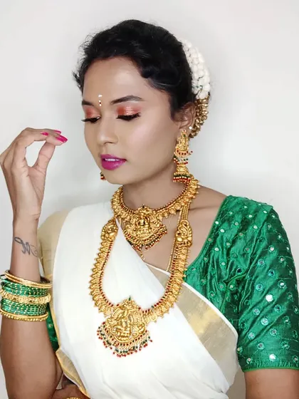 Another shot of my Onam look. As a nail artist, I love experimenting with my own nails to match different outfits and occasions.