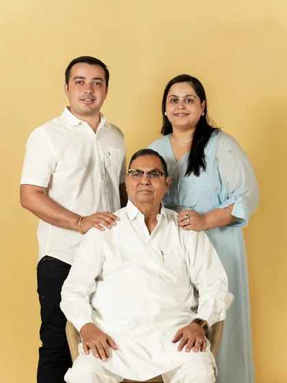 A beautiful portrait of a father with his adult son and daughter. It's a wonderful way to honor the head of the family.